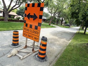 Road work signs on Homedale Boulevard in Windsor's Ward 6 on Sept. 9, 2014. (Tyler Brownbridge / The Windsor Star)