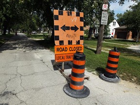 Road work signs on Homedale Boulevard in Windsor's Ward 6 on Sept. 9, 2014. (Tyler Brownbridge / The Windsor Star)
