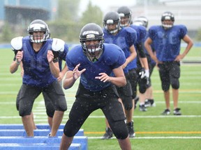 Tecumseh Vista players work out Wednesday in preparation for their high school football season opener. (JASON KRYK/The Windsor Star)