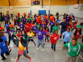 Much like this group of Girls and Boys Club kids is doing in the U.S., the Windsor chapter of the Heart and Stroke foundation wants your help to beat a Guinness World Record in jumping jacks. (Associated Press files)