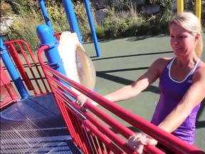 Windsor Star fitness reporter Kelly Steele gets her workout on at a playground.