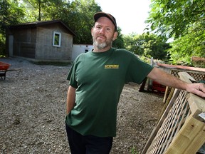 Dave Joncas, in front of his modest home in Windsor on September 12, 2014, is the last remaining resident of the Brighton Beach area. He is hoping to sell to the government.                    (TYLER BROWNBRIDGE/The Windsor Star)