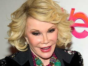 Joan Rivers attends a screening of a TV show in New York on Jan. 2012. Riverswas rushed to hospital in cardiac arrest on Aug. 28, 2014. Her family says she is on life support. (Associated Press files)