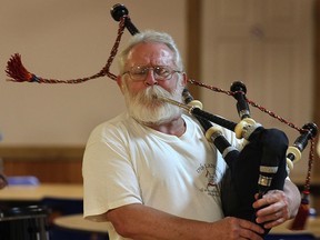 Tom Fox of the Scottish Society of Windsor Pipe Band is shown during a practice Thursday, Sept. 18, 2014, at the Scottish Club of Windsor.   (DAN JANISSE/The Windsor Star)