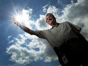 Sergio Grando, manager of energy initiatives with the city of Windsor, is seen on the roof of the Aquatic Centre in Windsor on Wednesday, September 3, 2014. The city is installing a network of solar panels on the roof.                (Tyler Brownbridge/The Windsor Star)