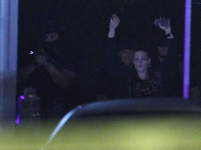 Windsor police arrest a woman after a 12 hour stand off at Tecumseh and Gladstone on Wednesday, Sept. 10, 2014, in Windsor, ON. (DAN JANISSE/The Windsor Star)