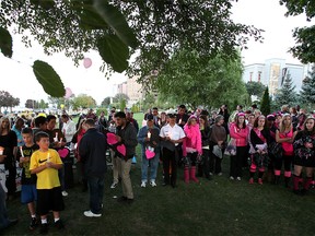 A crowd gathers at Dieppe Park for Windsor's Take Back the Night march in September 2012. (Kristie Pearce / The Windsor Star)