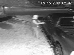 An image from a surveillance camera at a Southwood Lakes residence on Sept. 15, 2014. Windsor police are seeking the man in the video as a 'person of interest' in a series of thefts from cars. (Handout / The Windsor Star)