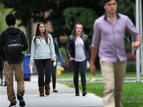 Students are shown at the University of Windsor campus on Thursday, Sept. 11, 2014, in Windsor, ON. Tuition may soon be on the rise. (DAN JANISSE/The Windsor Star)