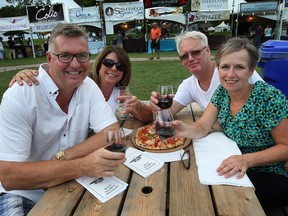 Mike Brunette (L) Sue Boismier, Paul and Denise Ausman are shown at the Shores of Erie International Wine Festival on Thursday, Sept. 4, 2014 in Amherstburg, ON. (DAN JANISSE/The Windsor Star)