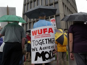 Windsor University Faculty Association (WUFA) members gather for an on-campus rally in this July 2014 file photo. (Nick Brancaccio / The Windsor Star)