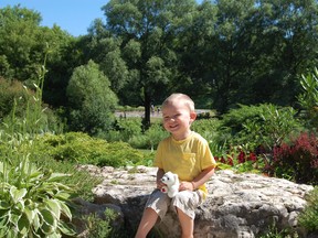 It’s always pleasing to see children, like Shane, enjoying local botanical gardens. (Courtesy of Mark Cullen)