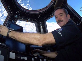 Canadian astronaut Chris Hadfield poses for a photo during his time aboard the International Space Station. Hadfield will be a special guest of the WSO's opening pops concerts on Oct. 17-19. (Courtesy of Chris Hadfield)