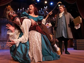 The University Players rehearse a scene from its first show of the season, Moliere Impromptu. Shown are David Jackson, left, Erin Burley and Eric Branget at the University of Windsor. (DAN JANISSE / The Windsor Star)