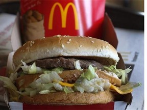 McDonald's Big Mac sandwich at a McDonald's restaurant in Robinson Township, Pa. The world’s biggest hamburger chain is confronting unappetizing questions as part of a U.S. campaign to beat back perceptions that it serves Frankenfood. The company has run similar campaigns in Canada and Australia and said Monday, Oct. 13, 2014, it’s bringing the effort to its flagship market. (AP/ Gene J. Puskar, File)