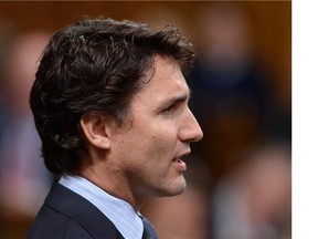 In this file photo, Liberal Leader Justin Trudeau speaks during question period in the House of Commons on Parliament Hill in Ottawa on Wednesday, Oct. 8, 2014.
(Sean Kilpatrick/Postmedia News)