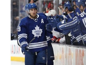 TORONTO, ON - MARCH 22: Joffrey Lupul #19 of the Toronto Maple Leafs celebrates a goal against the Montreal Canadiens during an NHL game at the Air Canada Centre on March 22, 2014 in Toronto, Ontario, Canada.
Photograph by: Claus Andersen , Ottawa Citizen