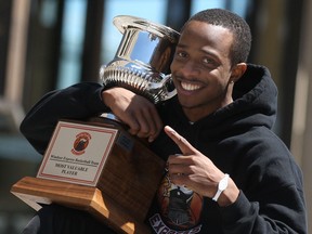 Windsor Express guard and finals MVP Stefan Bonneau makes his way down Ouellette during the championship parade. (DAX MELMER/The Windsor Star)