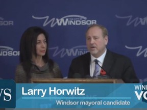 Windsor mayoral hopeful Larry Horwitz delivers his concession speech at the Caboto Club with wife Dana looking on.