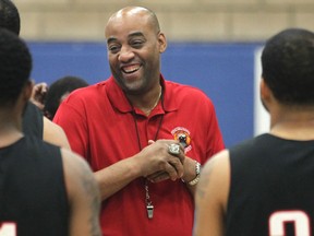 Windsor Express coach Bill Jones shares a laugh with players during media day Monday. (DAN JANISSE/The Windsor Star)