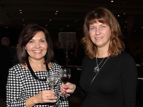 Pat Strome, left, and Susan Dunbar attend Wines of the World at St. Clair College Centre for the Arts, Friday October 24, 2014.  Proceeds support Rotary Club of Windsor-Roseland. (NICK BRANCACCIO/The Windsor Star)