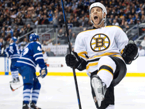 Boston's Gregory Campbell, right, celebrates his goal against the Maple Leafs Saturday. (THE CANADIAN PRESS/Nathan Denette)