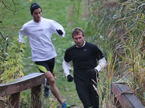 Nick Falk, right, and Michael Pesce run at Malden Park. (DAN JANISSE/The Windsor Star)