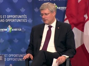 Prime Minister Stephen Harper speaks during a moderated question-and-answer in Brampton, Ont. on Thursday, October 2, 2014. THE CANADIAN PRESS/Darren Calabrese