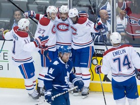 Montreal's Brendan Gallagher, from left, Alex Galchenyuk, Tomas Plekanec, P.K. Subban, and Alexei Emelin celebrate Plekanec's goal in front of Toronto's Phil Kessel during second period action in Toronto. (THE CANADIAN PRESS/Darren Calabrese)