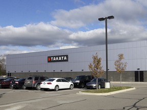 The Takata building, an automotive parts supplier in Auburn Hills, Mich. is seen on Wednesday, Oct. 22, 2014. The company is the North American subsidiary of the Japanese based Takata Corporation which supplies seat belts and airbags for the automotive industry. The government's auto safety agency says that inflator mechanisms made by Takata Corp. in the air bags can rupture, causing metal fragments to fly out when the bags are deployed. (AP Photo/Carlos Osorio)