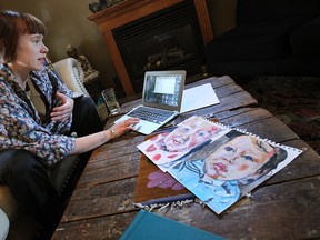 Melanie Janisse is photographed in her home in Windsor on Tuesday, October 28, 2014. The recent art school graduate has found a creative way to pay off her outstanding tuition and debt. She is painting $100 portraits using a crowd sourcing model. (TYLER BROWNBRIDGE/The Windsor Star)