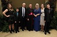 Megan Brisebois, Christian Brisebois, Paul Brisebois, Bishop Ronald Fabbro, Shawn-Anne Brisebois, Lauren Brisebois and Jonathan Brisebois (left to right) attend the annual Bishop's Dinner at the Ciociaro Club in Tecumseh on Thursday, October 30, 2014. (TYLER BROWNBRIDGE/The Windsor Star)