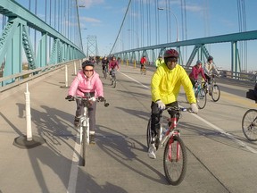 Approximately 500 cyclists crossed the Ambassador Bridge and back for Tour de Troit's annual 'Bike the Bridge' event, Sunday, Oct. 12, 2014.  The tour continued on throughout Windsor.  (DAX MELMER/The Windsor Star)