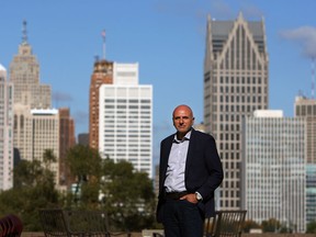 Joe Mikhail is photographed on the third floor roof of his building at the corner of Ouellette Avenue and Riverside Drive in Windsor on Wednesday, October 22, 2014. Mikhail is hoping to create a patio area and is looking to partner with the Windsor Club, which currently occupies the top floor of the building, or another partner.               (TYLER BROWNBRIDGE/The Windsor Star)