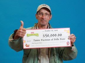 Oct. 2014-James Backman of Belle River won $50,000 top prize in the OLG Instant Crossword. (Courtesy of Ontario Lottery and Gaming Corp.)