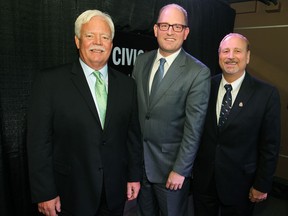 From left: Joh Millson, Drew Dilkens and Larry Horwitz in The Windsor Star News Cafe on Oct. 14, 2014. (Dax Melmer / The Windsor Star)