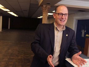 Drew Dilkens is interviewed while cleaning up his campaign headquarters on Howard Avenue in Windsor, Ontario on October 28, 2014. Dilkens won the mayoral race to become Windsor's next mayor. (JASON KRYK/The Windsor Star)