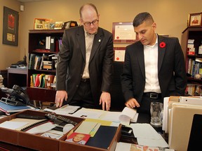 Newly elected mayor Drew Dilkens gets a look at his new office from outgoing mayor Eddie Francis at Windsor City Hall on Oct 28, 2014. (JASON KRYK/The Windsor Star)