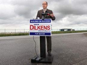 Windsor mayoral candidate Drew Dilkens holds a media conference Tuesday, Oct. 7, 2014 in front of the Premier Aviation airport hanger in Windsor, ON. He presented his plan on job creation. (DAN JANISSE/The Windsor Star)