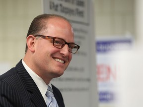 Drew Dilkens smiles as he unveils his "Proven Jobs Plan" during a press conference on October 21, 2014 in Windsor, Ontario.   (JASON KRYK/The Windsor Star)