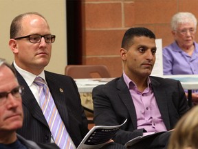 Windsor mayoral candidate Drew Dilkens (L) and current mayor Eddie Francis (R) attend a Ward 1 candidates debate on Oct. 2, 2014. (Nick Brancaccio / The Windsor Star)