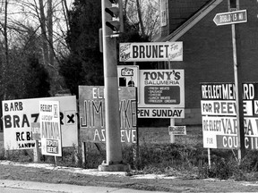 Election signs crowd a street corner in Windsor in this 1975 file photo.