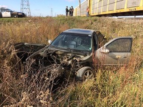 A woman suffered only minor injuries after a freight train struck her car on Golfview Drive in Lakeshore on October 22, 2014. (DAN JANISSE/The Windsor Star)