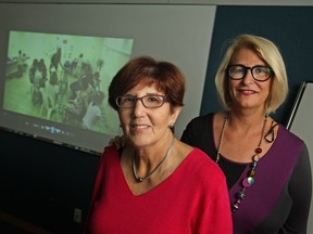 Sandi Malowitz, left, program director for the Windsor Jewish Community Centre, and Ronna Warsh, president of the centre, pictured Monday, Oct. 6, 2014, recently held an event to pray for peace in Israel in which they played a video, pictured in back drop, of messages from family and friends who are living in Israel.  (DAX MELMER/The Windsor Star)