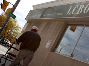 A man passes the LCBO at 400 University Ave W., Thursday Oct. 9, 2014. A recent report by CAMH said legalizing and regulation marijuana could reduce harms associated with cannabis use. (RICK DAWES/The Windsor Star)