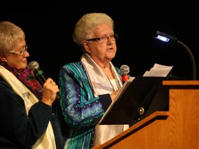 Associate Lucille VanEssen, left, and Sister Antoinette Janisse, speak at an event celebrating 150 years of service by the Sisters of the Holy Names of Jesus and Mary at Holy Names Catholic High School, Sunday, Oct. 26, 2014.  (DAX MELMER/The Windsor Star)