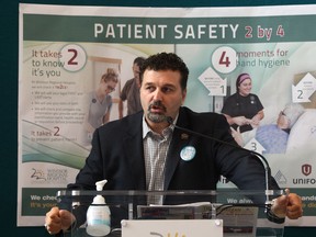 Dino Chiodo, president of Unifor Local 444, speaks at a press conference at the Ouellette campus regarding a new hygiene program,  Tuesday, Oct. 14, 2014.  Chiodo's father passed away from a C. difficile infection in January 2014.   (DAX MELMER/The Windsor Star)