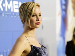 In this May 10, 2014 file photo released by Twentieth Century Fox, actress Jennifer Lawrence attends the global premiere of "X-Men: Days of Future Past," in New York. Lawrence, 24, is speaking out about those nude photos that were stolen via hacking and posted online in an exclusive interview with Vanity Fair for its November issue. The Nov. issue of Vanity Fair goes on sale Oct. 14. (AP Photo/Twentieth Century Fox, Eric Charbonneau, File)