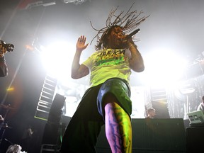 In this Nov. 1, 2013, file photo, Waka Flocka Flame performs at Aokify America Tour in New York. Police say the rapper was arrested after a handgun was found in his carry-on bag during a security scan at Atlanta's airport. He was arrested Friday, Oct. 10, 2014, and charged with carrying a weapon in a prohibited place. (Photo by Donald Traill/Invision/AP, File)
