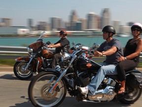 In this file photo, motorcycle riders cruise down Riverside Drive West, Sunday, June 23, 2013. (DAX MELMER/The Windsor Star)